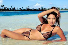 Lorabel Rey lying in bikini